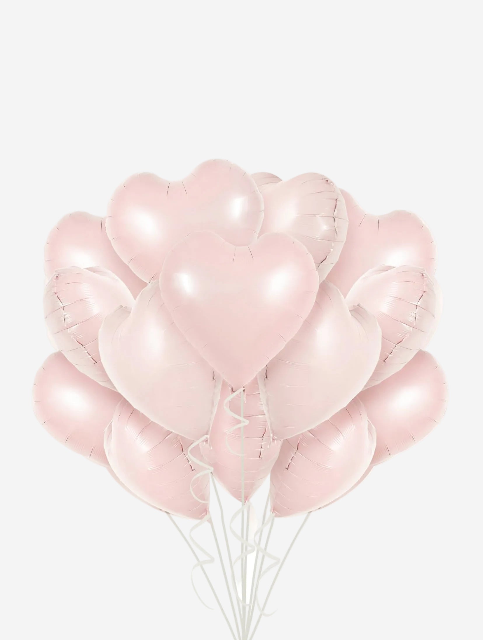 Baby pink heart-shaped foil balloons