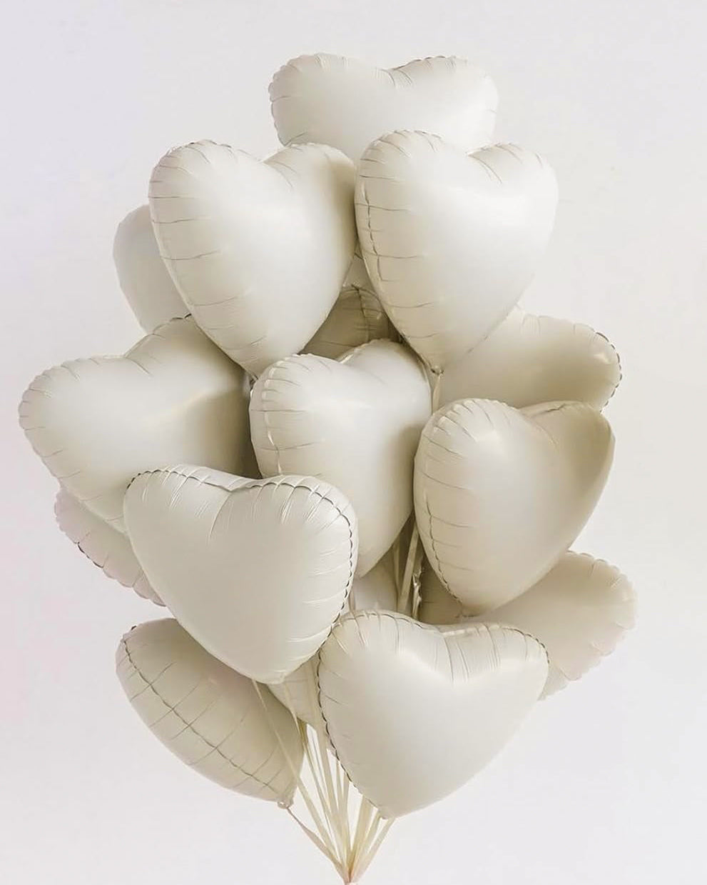 Cream white heart-shaped foil balloons