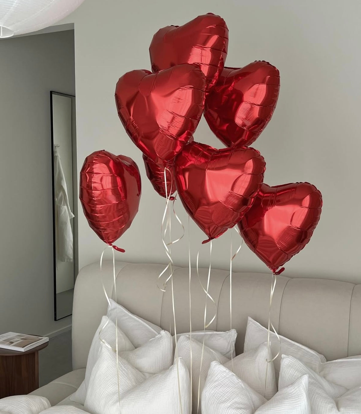 Red heart-shaped foil balloons